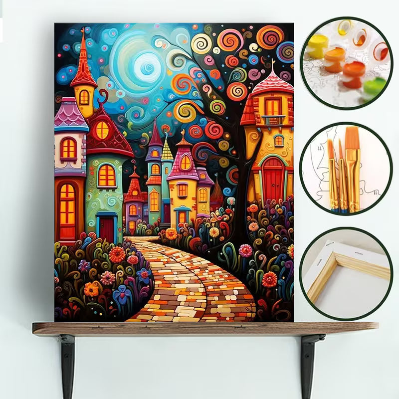 Картина за оцветяване по номера с цветна приказна илюстрация на фантазно градче с къщи и виеща се пътека, с включени номерирани бои, четки и подрамка.