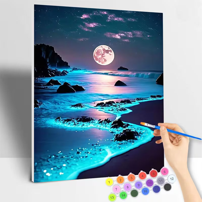 Картина за оцветяване по номера с  нощен морски пейзаж, пълна луна и светеща тюркоазена вода, показан в процес на изработка с апликатор и цветни мъниста.