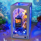 Book nook „Underwater World“ с LED осветление, миниатюрен подводен влак и морски елементи, декоративна книжна ниша в подводна сцена