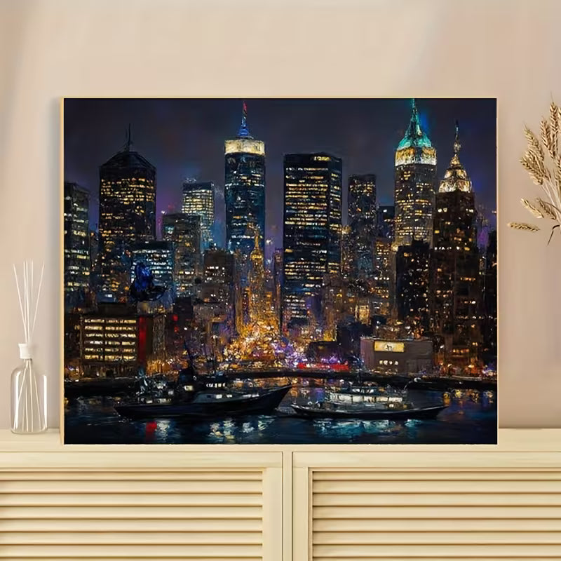 Готова картина по номера с нощен градски пейзаж и осветени небостъргачи, изложена в интериор