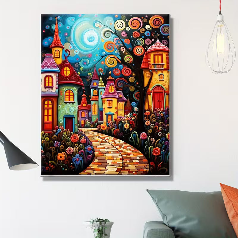 Декоративна картина с цветна приказна илюстрация на фантазно градче с къщи, виеща се пътека и орнаментални елементи, подходяща за стенна декорация в дома.